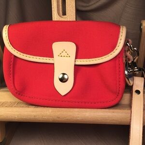 Dooney & Bourke NWOT leather and canvas wristlet